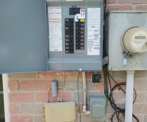 Panel with portable generator interlock & inlet